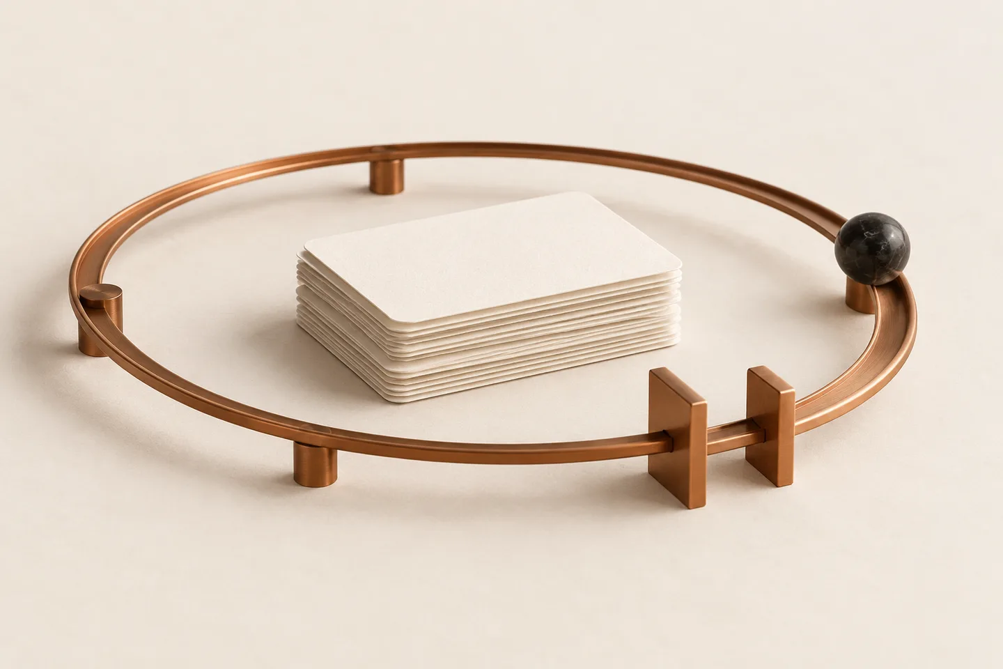A copper track circles work cards and passes through a small physical gate.
